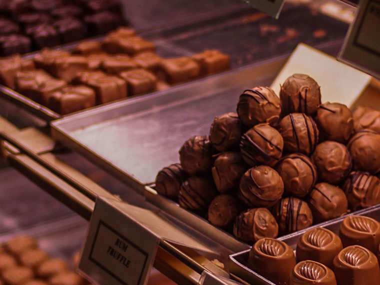 Chocolate truffles in a display case