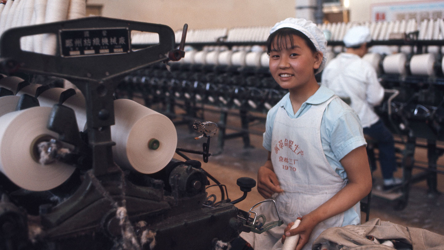 A women working in a Chinese textile factory