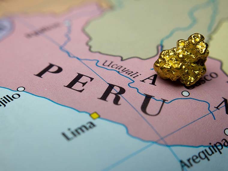 Map of Peru with gold nugget on top