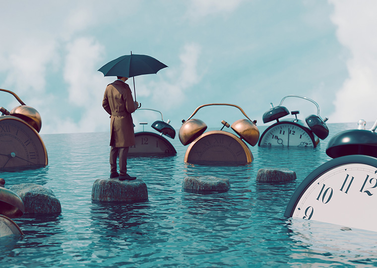 An illustration of a man holding an umbrella standing ina sea of alarm clocks.