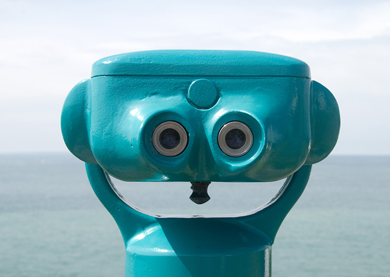 An aqua-colored view finder pointed at the ocean.