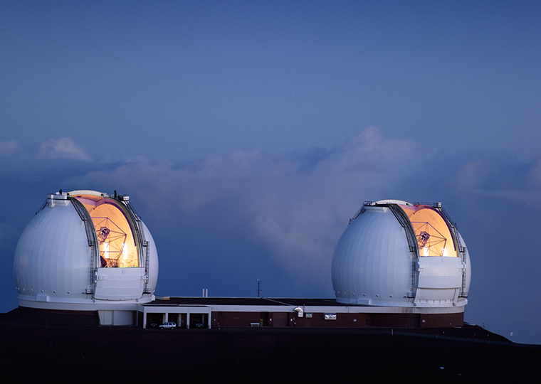 Telescopes with sky and clouds