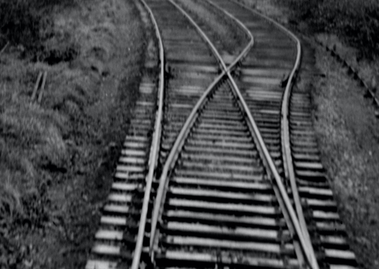 Black and white image of train tracks