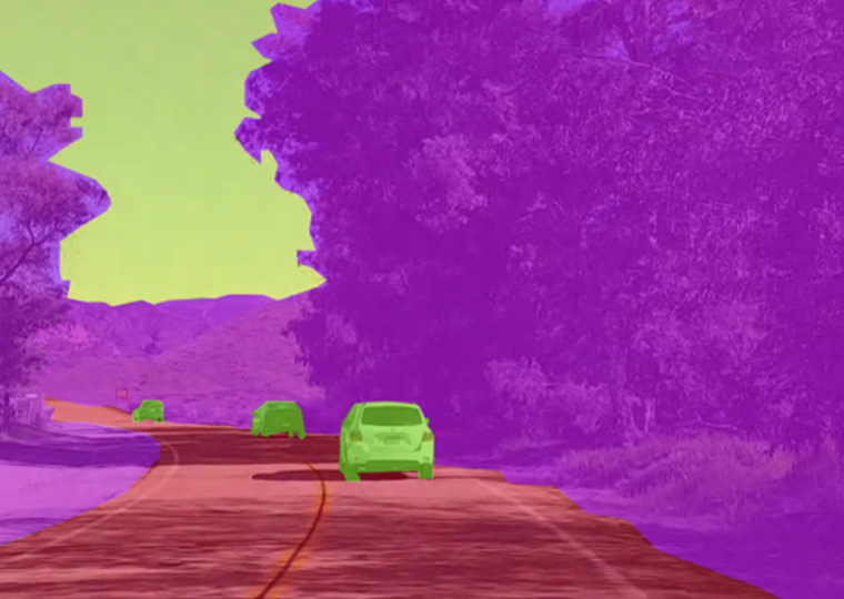 Semantic segmentation of cars on a road.