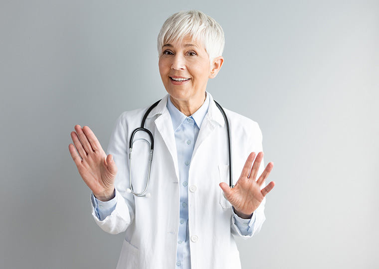 Personal perspective view of a female doctor talking with a patient