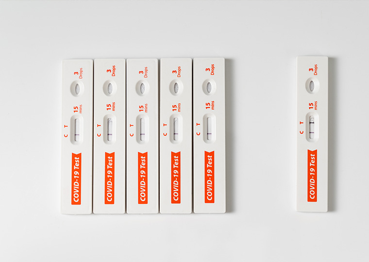 Five negative COVId-19 tests and one positive test off to the side.