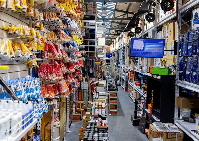 Aisle with merchandise at a hardware store.